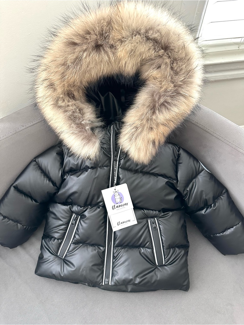 A striking new children's winter down jacket with natural fur size 1,5-2 T
